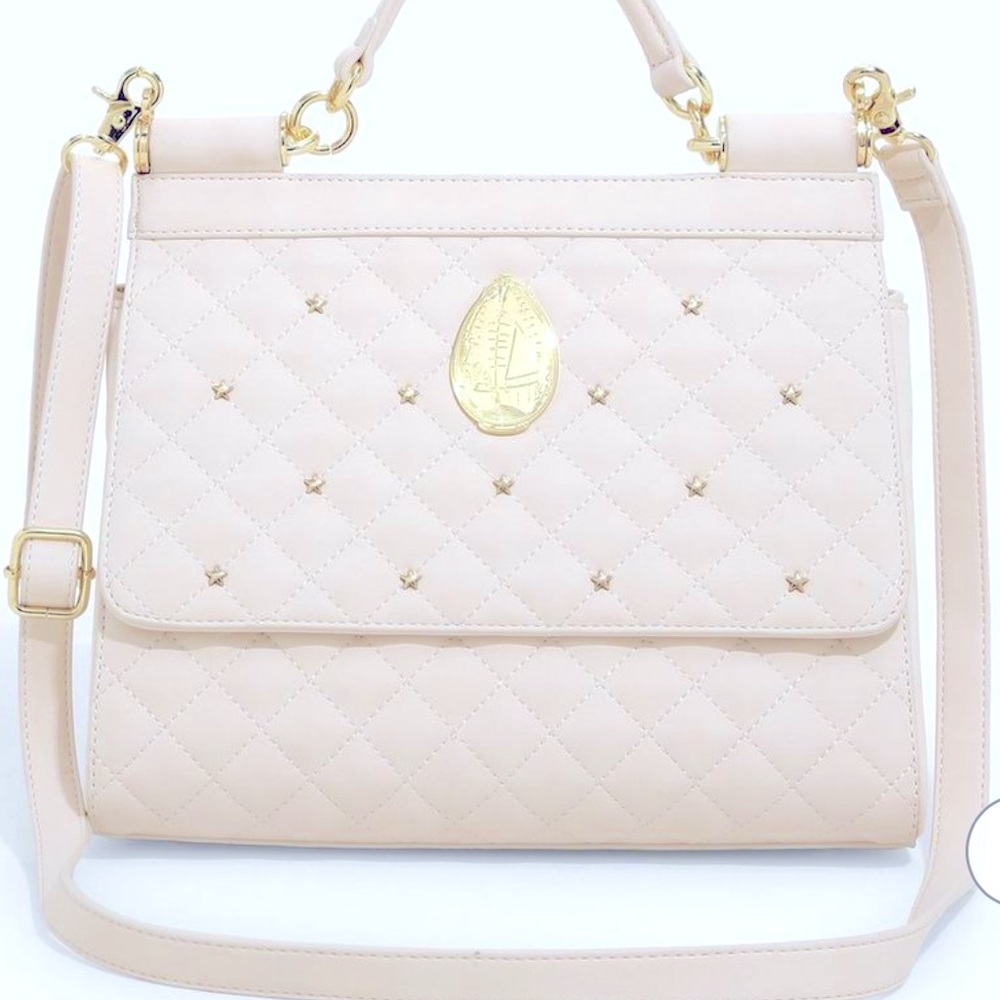 White Harry Potter loungefly purse (triwizard tournament egg) emblem